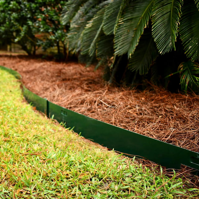 Green Steel Edging installed around grass lawn