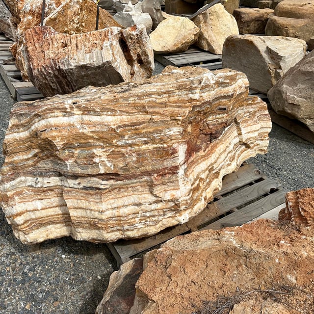 Black Canyon Onyx Boulders on a pallet for sale at Southwest Boulder & Stone