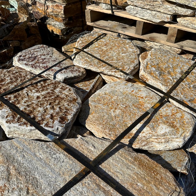 Salmon Red Quartzite Tumbled Stepping Stones for sale at rock yard