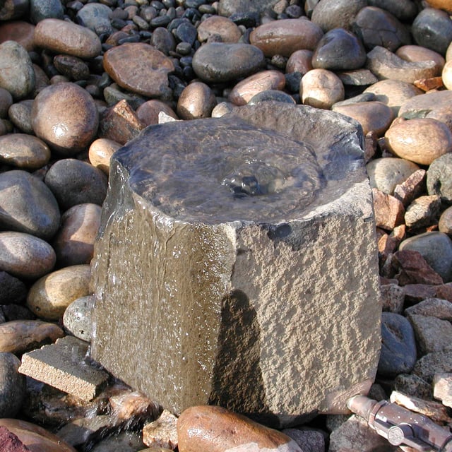 Basalt stone bowl fountain at rock yard 1
