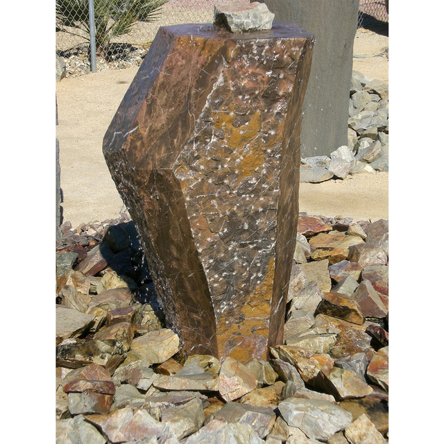 Mizubachi custom bronze stone fountain installed over crushed rock 