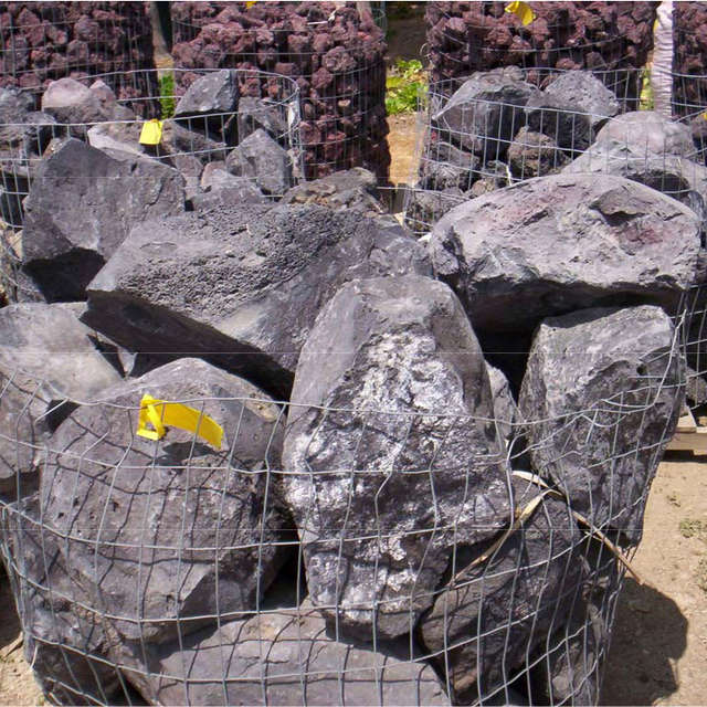 Mixed lava boulders in rock cage