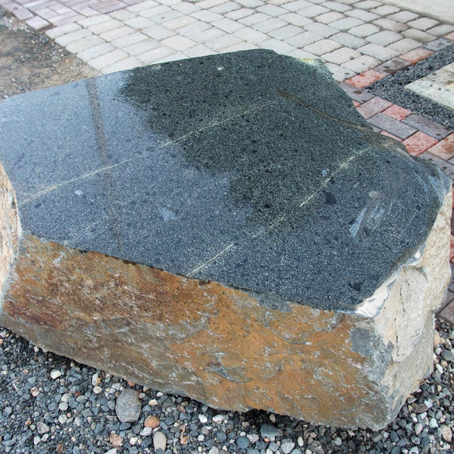 Polished granite stone table top displayed at rock yard
