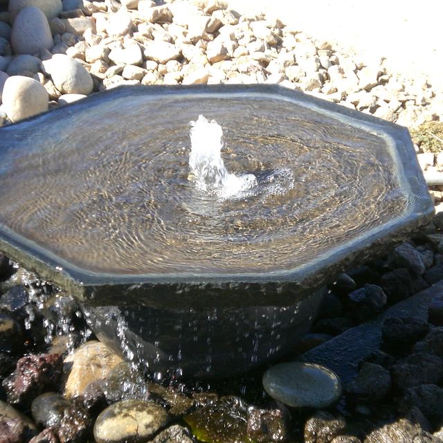 Sushi dish custom stone fountain installed or pebble at rock yard 2