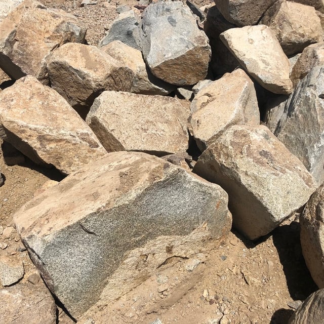 Desert Select landscape boulder pile in rock yard