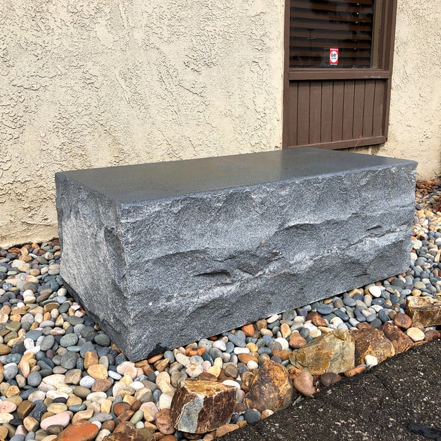 Granite Block Bench installed next to commercial building