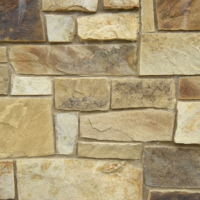 Longhorn Stone Veneer Natural Ledgestone on rock wall project