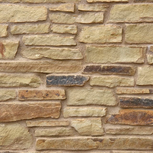 Hillside Stone Veneer Natural Ledgestone on rock wall project
